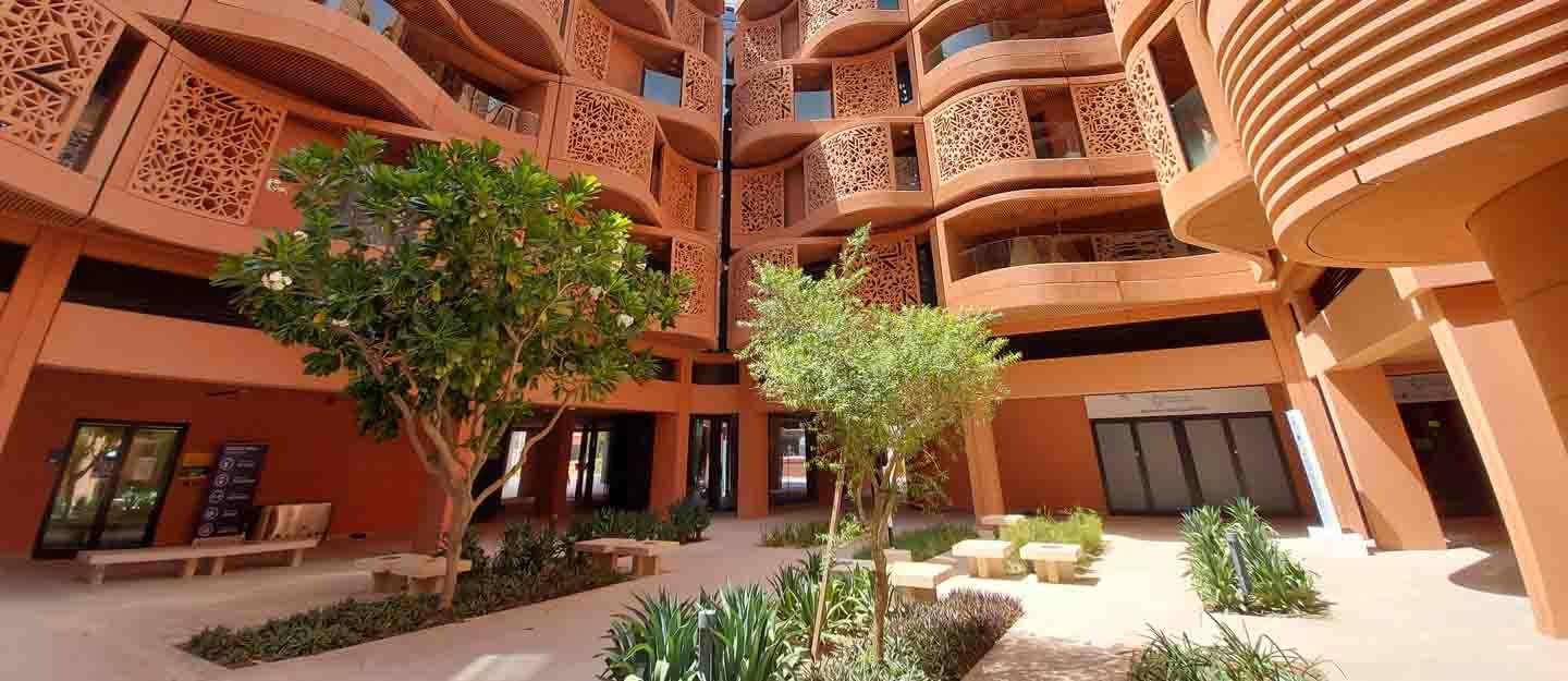 Image: Courtyard planting and climate-responsive façades — supplied to WAAR